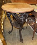 A Victorian style circular cast iron pub table, with mahogany top, 58cm diameter, H.74cmCONDITION: