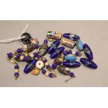 A hardstone and gilded paste bead necklace (a.f.) and a selection of loose paste beads including