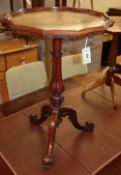 A Victorian gallery topped mahogany tripod table, W.52cm, H.72cmCONDITION: The shaped top central