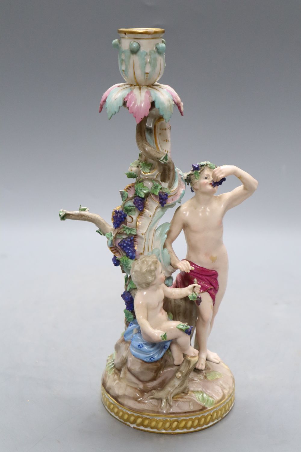 A Meissen 'Bacchus and cherub' candelabrum, 19th century, model no 1190, H. 29cmCONDITION: The - Image 2 of 5