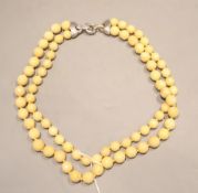 A 20th century double strand graduated facetted hardstone necklace with 925 clasp, 60cm.