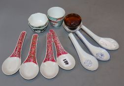 A collection of tea bowls and spoons