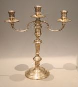 A modern silver two branch three light silver candelabrum, William Comyns & Sons Ltd, London, 1966/