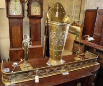 Four brass items, comprising a student's lamp, a table lamp, a 'grape pannier' stick stand and a