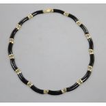 A stylish 9k and curved black onyx link necklace, approx. 40cm, gross 20 grams.