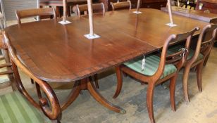 A Regency style mahogany twin pedestal extending dining table, 200cm extended (one spare leaf) W.