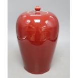 A 19th century Chinese flambe vase and coverCONDITION: Crazing visible throughout as well as other