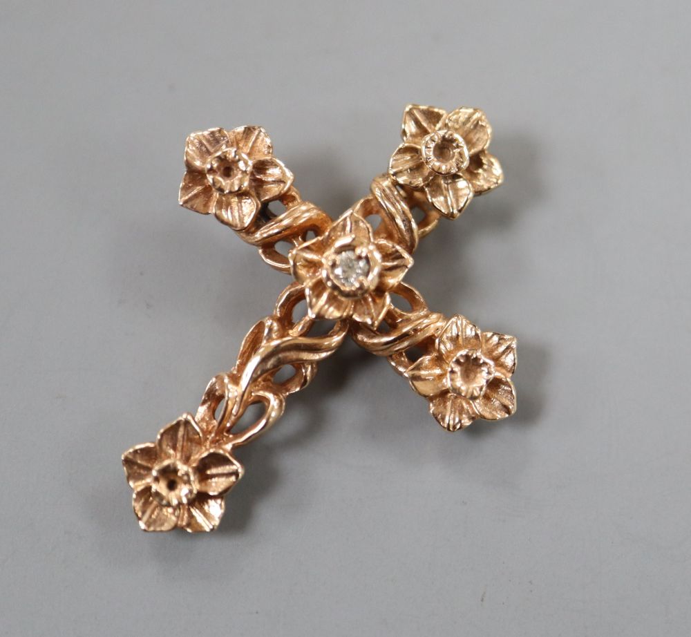 A Stuart Devlin 14ct 'Welsh gold' and diamond set cross pendant, 30mm, gross 3.8 grams.CONDITION: