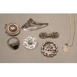 Seven assorted items of sterling or white metal jewellery including Scandinavian brooch, 64mm.