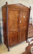 A Regency mahogany linen press, W.136cm, D.60cm, H.214cmCONDITION: The upper section interior