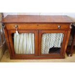 A pair of Regency mahogany side cabinets, with applied gilt metal Egyptian motifs, W.120cm, D.