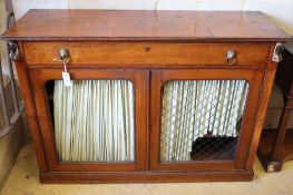 A pair of Regency mahogany side cabinets, with applied gilt metal Egyptian motifs, W.120cm, D.