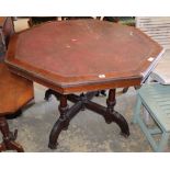 A late Victorian Gothic revival octagonal mahogany library table, W.106cm, H.75cmCONDITION: The