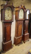 Three George III oak and mahogany longcase clocksCONDITION: The oak cased clock has an eight day