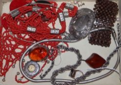 Mixed jewellery including a large multi strand coral bead necklace, amber brooch(a.f.) and