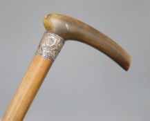 A Chinese horn and silver stick, possibly rhino horn