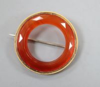 A yellow metal mounted facetted agate openwork circular brooch, 36mm, gross 8.4 grams.CONDITION: