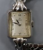 A lady's stainless steel Omega manual wind wrist watch, on associated bracelet.CONDITION: Case