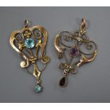 Two early 20th century 9ct and gem set drop pendants, largest 41mm, gross 4 grams.