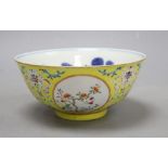 A Chinese yellow ground enamelled bowl, Daoguang mark, diameter 15cmCONDITION: General minor wear to
