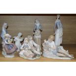 Five Lladro figures, a Nao figure and a Miquel Requena figure, comprising Boy with bird on a tree