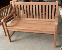 A teak garden bench, W.120cm, D.56cm, H.90cmCONDITION: As new condition