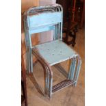 A set of five vintage painted metal stacking chairs