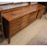 A mid century rosewood sideboard, W.213cm, D.46cm, H.76cmCONDITION: Areas of water damage, one