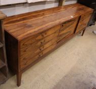 A mid century rosewood sideboard, W.213cm, D.46cm, H.76cmCONDITION: Areas of water damage, one