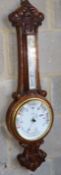 A Victorian carved oak aneroid banjo barometer / thermometer marked Bamber, Preston, H.86cm