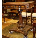 A Victorian carved walnut writing-cum-reading table, W.64cm, D.48cm, H.77cmCONDITION: The leather