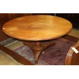 A Victorian pine circular topped dining table, diameter 146cm, H.74cm