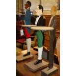 Three painted carved wood dumb waiters, largest 89cm high
