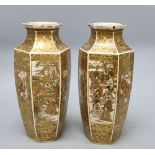 A pair of Japanese Satsuma hexagonal vases, height 24cmCONDITION: One has a crack over the rim,