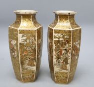 A pair of Japanese Satsuma hexagonal vases, height 24cmCONDITION: One has a crack over the rim,