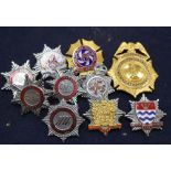 A collection of Fire Brigade badges