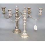 A pair of plated two branch candelabra
