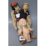 A vintage Kewpie doll and two others