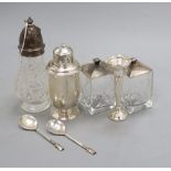 A pair of silver mounted jars, silver spoons, two sugar casters and a posy vase, tallest 18.5cm, 8.
