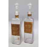 A pair of Morny factice display bottles, Eau de Cologne and Lavender Water, overall height 34cm