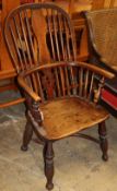 A Victorian ash and elm Windsor armchair (later upper splat)