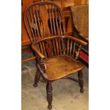 A Victorian ash and elm Windsor armchair (later upper splat)