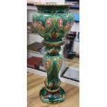 A majolica jardiniere on stand, height 115cm