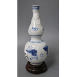 A Chinese miniature double gourd vase and stand, Kangxi, height 13.5cm