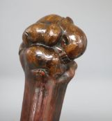 A 'kneeling man' knobkerrie, with bone mounted handle, length 60cm