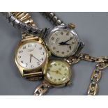 A lady's 9ct gold Tudor manual wind wrist watch and two others.
