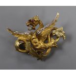 A 19th century French two colour yellow metal and diamond chip set dragon brooch, with cabochon eye,