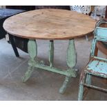 A 19th century Continental circular pine folding tilt top table, 104cm diameter, H.73cm