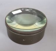 A brass bound optimus magnifying glass, diameter 21cm