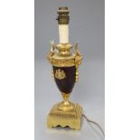A gilt brass table lamp
